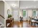 Open entryway featuring hardwood floors and a dining area with natural light at 687 Monticello Se Way, Marietta, GA 30067