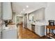 Modern kitchen with gray cabinets, stainless steel appliances, and marble backsplash at 687 Monticello Se Way, Marietta, GA 30067