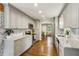 Modern kitchen features granite countertops, stainless steel appliances and ample cabinet space at 687 Monticello Se Way, Marietta, GA 30067