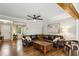 Comfortable living room with a leather sectional, hardwood floors, and neutral paint at 687 Monticello Se Way, Marietta, GA 30067