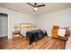 Bedroom with a hardwood floor and a ceiling fan at 13789 Woolsey Rd, Hampton, GA 30228