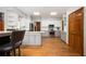 Modern kitchen featuring stainless steel appliances, hardwood floors, and ample countertop space at 13789 Woolsey Rd, Hampton, GA 30228