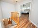 Hallway leading to main bedroom with trey ceiling and modern ceiling fan at 13789 Woolsey Rd, Hampton, GA 30228