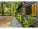Charming home exterior featuring well-maintained landscaping and unique architectural details at 2468 Fallview Ter, Atlanta, GA 30344