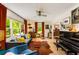 Bright living room with hardwood floors, large windows, and stylish furnishings at 2468 Fallview Ter, Atlanta, GA 30344