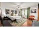 Serene bedroom with hardwood floors, area rug, and natural light from the windows at 2600 Sandpiper Dr, Tucker, GA 30084