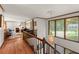 Hallway showcasing hardwood floors, crown molding, and a view of the living room at 2600 Sandpiper Dr, Tucker, GA 30084