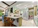 Bright kitchen with tiled floors, stainless appliances, and an adjacent eating area at 2600 Sandpiper Dr, Tucker, GA 30084