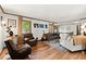 Spacious living room featuring hardwood floors, stylish furnishings, and ample natural light at 2600 Sandpiper Dr, Tucker, GA 30084