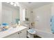 Bright bathroom with a clean, white shower-tub combo and marble top vanity at 58 Lilyfield Ln, Acworth, GA 30101