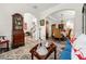 Comfortable living room featuring stylish decor with hardwood floors that lead into a formal dining area at 58 Lilyfield Ln, Acworth, GA 30101