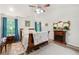 Serene bedroom with natural light, complemented by a fireplace and elegant decor at 58 Lilyfield Ln, Acworth, GA 30101