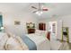 Bright main bedroom featuring a decorative fireplace, creating a serene retreat at 58 Lilyfield Ln, Acworth, GA 30101