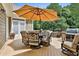 Inviting back deck with grill and outdoor seating, perfect for entertaining or relaxing outdoors at 245 Maple Shade Dr, Tyrone, GA 30290