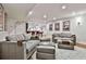 Finished basement features a comfortable seating area and open layout, great for entertainment at 245 Maple Shade Dr, Tyrone, GA 30290