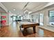 Spacious finished basement with a pool table and bar area, offering an excellent entertainment space at 245 Maple Shade Dr, Tyrone, GA 30290