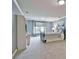 Spacious bedroom with sitting area, soft carpet and ensuite bathroom at 245 Maple Shade Dr, Tyrone, GA 30290