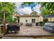 Wide wooden deck is perfect for entertaining with access to the home's backyard and exterior at 4520 Dallas St, Acworth, GA 30101