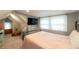 Bedroom showcasing a metal-frame bed, neutral carpet, windows, and gray walls at 4520 Dallas St, Acworth, GA 30101