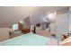Bedroom features a unique angled ceiling, with natural light from the window, and a trunk at 4520 Dallas St, Acworth, GA 30101