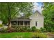 Charming home featuring a screened-in porch and beautifully landscaped yard at 4520 Dallas St, Acworth, GA 30101