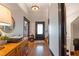 Inviting hallway featuring hardwood floors and vintage accents at 4520 Dallas St, Acworth, GA 30101