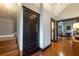 Elegant hallway featuring hardwood floors and staircase at 4520 Dallas St, Acworth, GA 30101