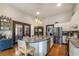 Spacious eat-in kitchen with stainless appliances, large island, and hardwood floors at 4520 Dallas St, Acworth, GA 30101
