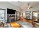 Cozy living room offers a wood-burning stove fireplace and access to the Kitchen at 4520 Dallas St, Acworth, GA 30101