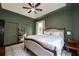 Lovely main bedroom featuring hardwood floors, a ceiling fan, and two windows at 4520 Dallas St, Acworth, GA 30101