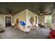 Relaxing screened porch with comfortable seating, ceiling fans, and natural light at 4520 Dallas St, Acworth, GA 30101