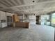 Unfinished kitchen with a large center island, custom cabinetry and large windows at 0 Thompson Mill Rd, Buford, GA 30519