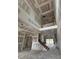 Spacious living room featuring high ceilings and staircase, offering a grand and open living space at 0 Thompson Mill Rd, Buford, GA 30519