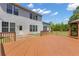 Spacious backyard with large deck and gazebo, perfect for outdoor entertaining and relaxation at 102 Plantation Dr, Lagrange, GA 30277