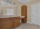 Spacious bathroom features a vanity with drawers and a countertop with a built in desk area at 102 Plantation Dr, Lagrange, GA 30277