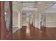 Spacious foyer featuring hardwood floors and an open, two-story entry at 102 Plantation Dr, Lagrange, GA 30277