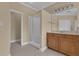 Main bathroom featuring shower, vanity and tile floor at 102 Plantation Dr, Lagrange, GA 30277
