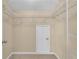 Spacious walk-in closet with ample shelving and storage space for organization and convenience at 102 Plantation Dr, Lagrange, GA 30277