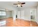 Spacious main bedroom featuring a ceiling fan and access to the bathroom and closet at 1301 Parkaire Xing, Marietta, GA 30068