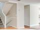 Traditional staircase design with neutral walls and white trim leading to the upper level at 1301 Parkaire Xing, Marietta, GA 30068