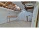 Unfinished basement featuring concrete floors and block walls, great for storage and expansion at 1618 Mason Mill Ne Rd, Atlanta, GA 30329