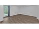 Bright bedroom with luxury vinyl floors, ample natural light, and fresh paint at 1618 Mason Mill Ne Rd, Atlanta, GA 30329
