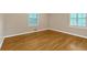 Bedroom features hardwood floors and natural light, creating a cozy and inviting atmosphere at 1618 Mason Mill Ne Rd, Atlanta, GA 30329