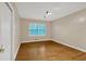 Cozy bedroom with hardwood floors and natural light from a bright window at 1618 Mason Mill Ne Rd, Atlanta, GA 30329