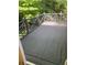 Outdoor deck overlooking lush foliage, featuring decorative railings and a relaxing space to enjoy the natural beauty at 1618 Mason Mill Ne Rd, Atlanta, GA 30329