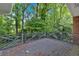 Wooden deck overlooking a lush, wooded backyard, offering privacy and tranquility at 1618 Mason Mill Ne Rd, Atlanta, GA 30329