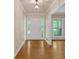 Home's bright entry showcasing hardwood floors and a view to the exterior at 1618 Mason Mill Ne Rd, Atlanta, GA 30329