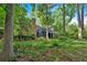 View of deck and wooded home exterior at 1618 Mason Mill Ne Rd, Atlanta, GA 30329