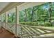 Inviting front porch features rocking chairs and beautiful views of the yard at 1618 Mason Mill Ne Rd, Atlanta, GA 30329