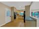 Well-lit eat-in kitchen with hardwood floors, built-in appliances and a convenient kitchen island at 1618 Mason Mill Ne Rd, Atlanta, GA 30329